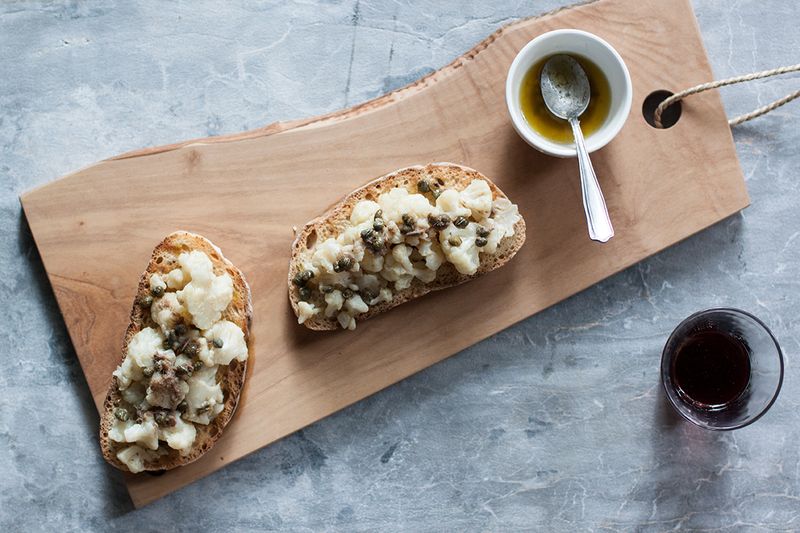 Cauliflower Crostone with Anchovy and Caper Sauce