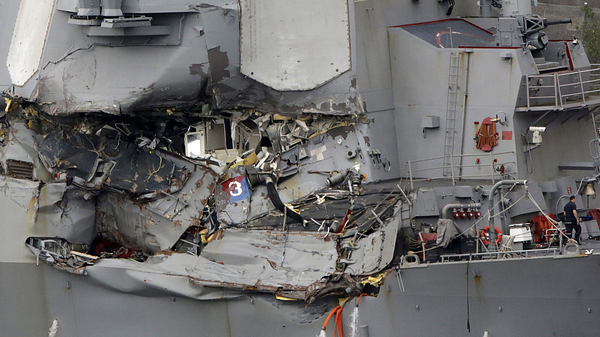 The damaged section of the USS Fitzgerald is seen at the U.S. naval base in Yokosuka, southwest of Tokyo.