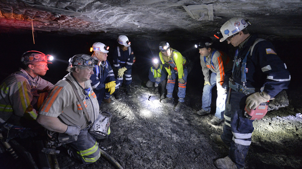 Mine-safety officials speak with workers at the Gibson North mine in Princeton, Ind. in 2015.