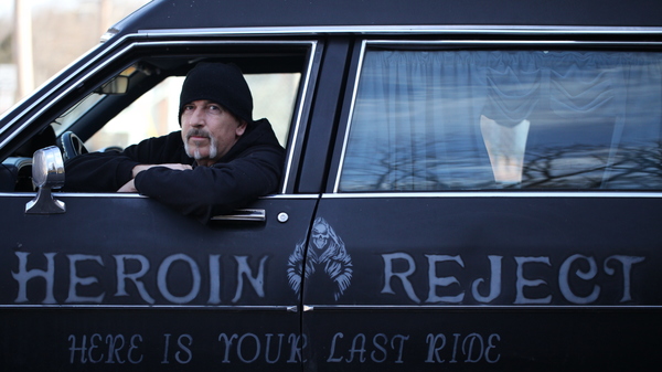 Dwayne Wood behind the wheel of the "Heroin Hearse."