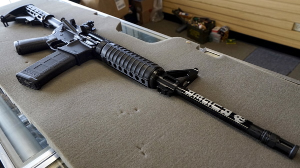 Ruger says it will comply with a shareholder initiative calling for it to track gun violence. Here, a  Ruger AR-15 rifle is seen for sale in Colorado.