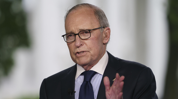 White House chief economic adviser Larry Kudlow speaks during a television interview outside the West Wing of the White House on May 18. President Trump tweeted that Kudlow suffered a heart attack and is hospitalized at Walter Reed Medical Center.