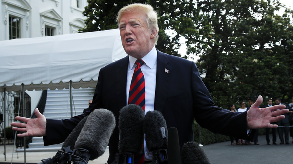 President Donald Trump speaks to reporters before leaving the White House on June 8 to attend the G7 Summit in Charlevoix, Quebec, Canada.
